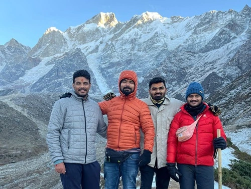 Badrinath Temple snow capped mountain view