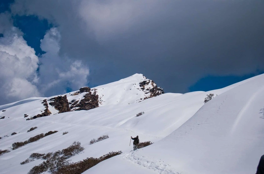 Snow covered mountain all around tungnth temple which is part of Panchkedar temples