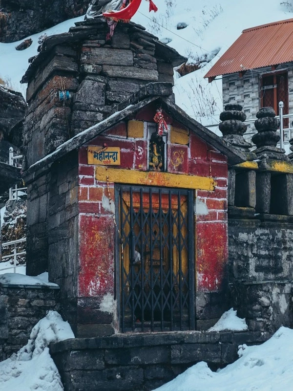 Snow capped mountain and frozen riven along the chardham yatra route