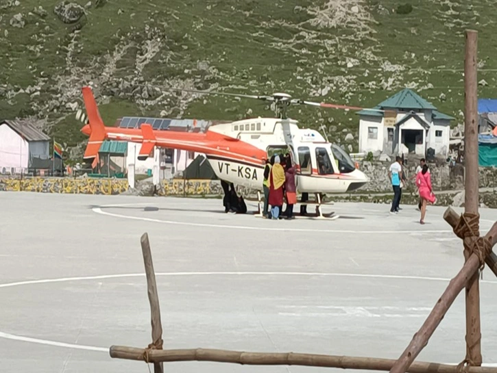 Pilgrims boaring to helicopter for do dham yatra