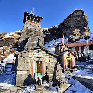 Snow covered Tungnath temple which can be visited during do dham yatra package