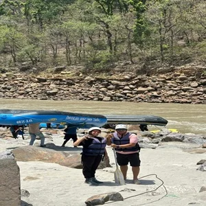 Couple enjoying the complementary river rafting provided in our package to Kedarnath temple